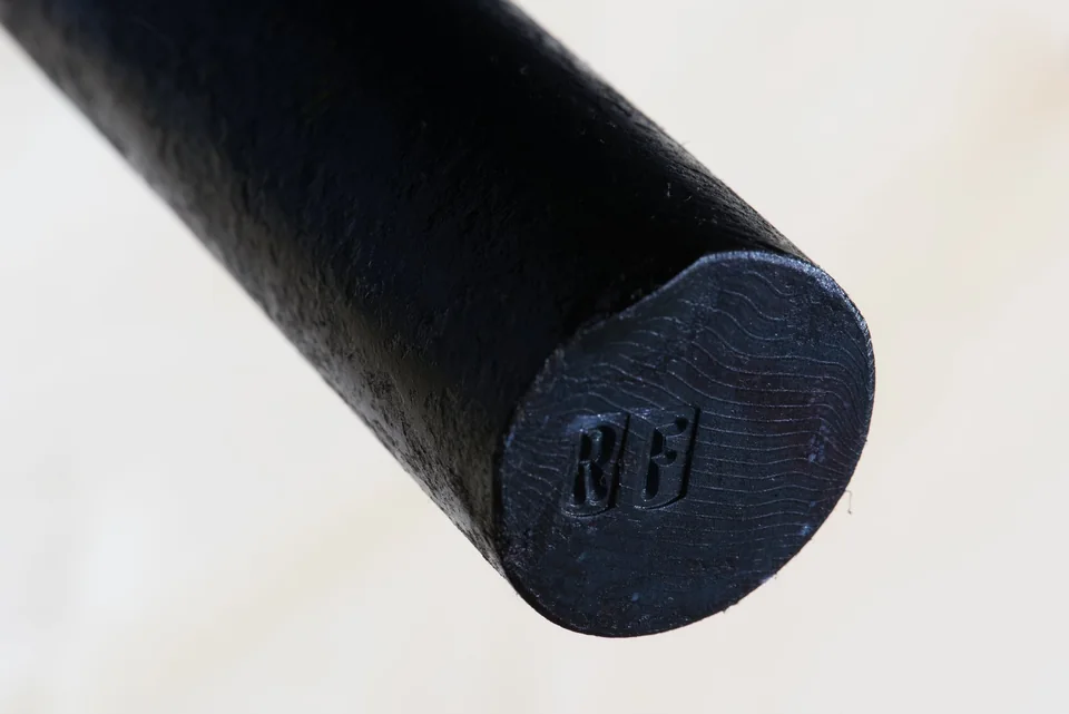 Cut end of a forge-ready DSC Damascus round